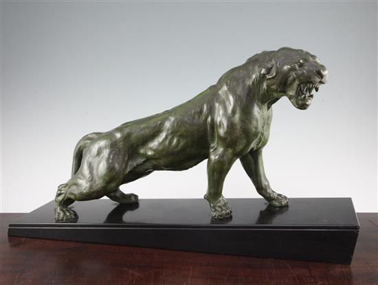 After Thomas Francois Cartier (1879-1943). A French Art Deco green patinated model of a snarling panther, 24.5in.